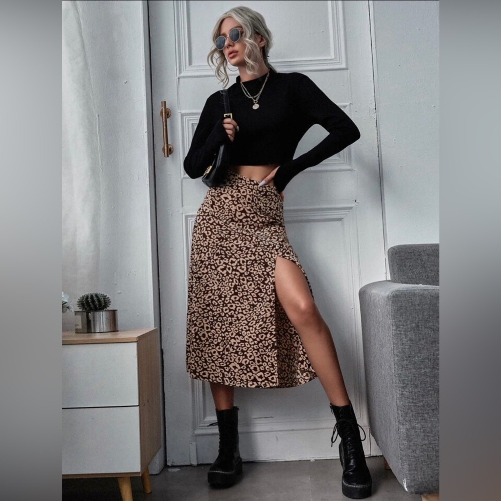 Brown patterned skirt with leg slit.